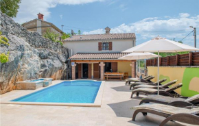 Nice home in Plomin with Outdoor swimming pool, WiFi and 3 Bedrooms